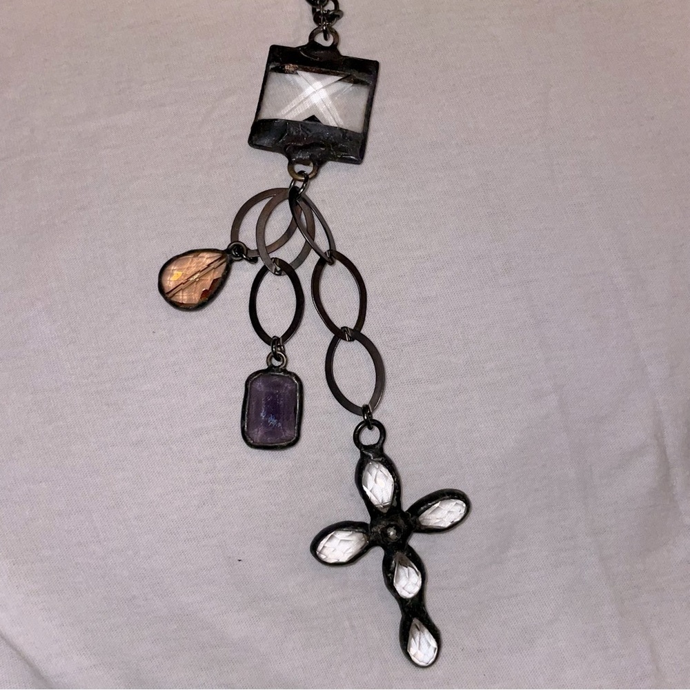 Pendant necklace. Long, lol hangs almost belly button. You can adjust.